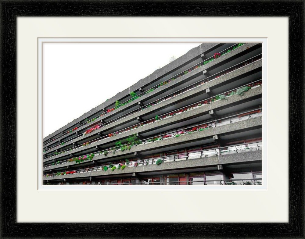 Brutalist estate balconies covered in flowers and plants, London