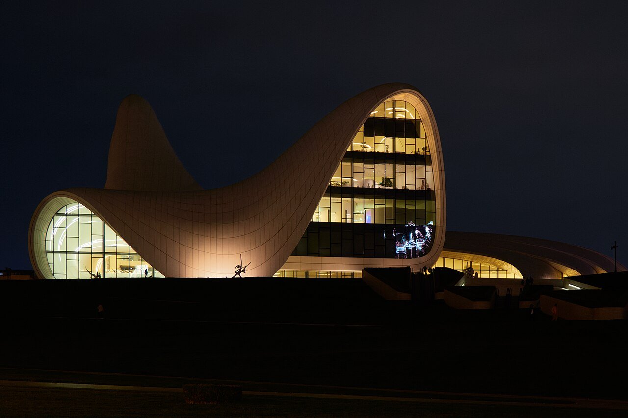 Heydar Aliyev Center, Baku, illuminated at night, designed by Zaha Hadid Architects