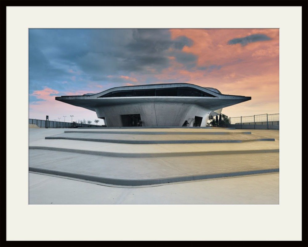 Framed architectural photograph of a concrete pavilion in a matte black frame